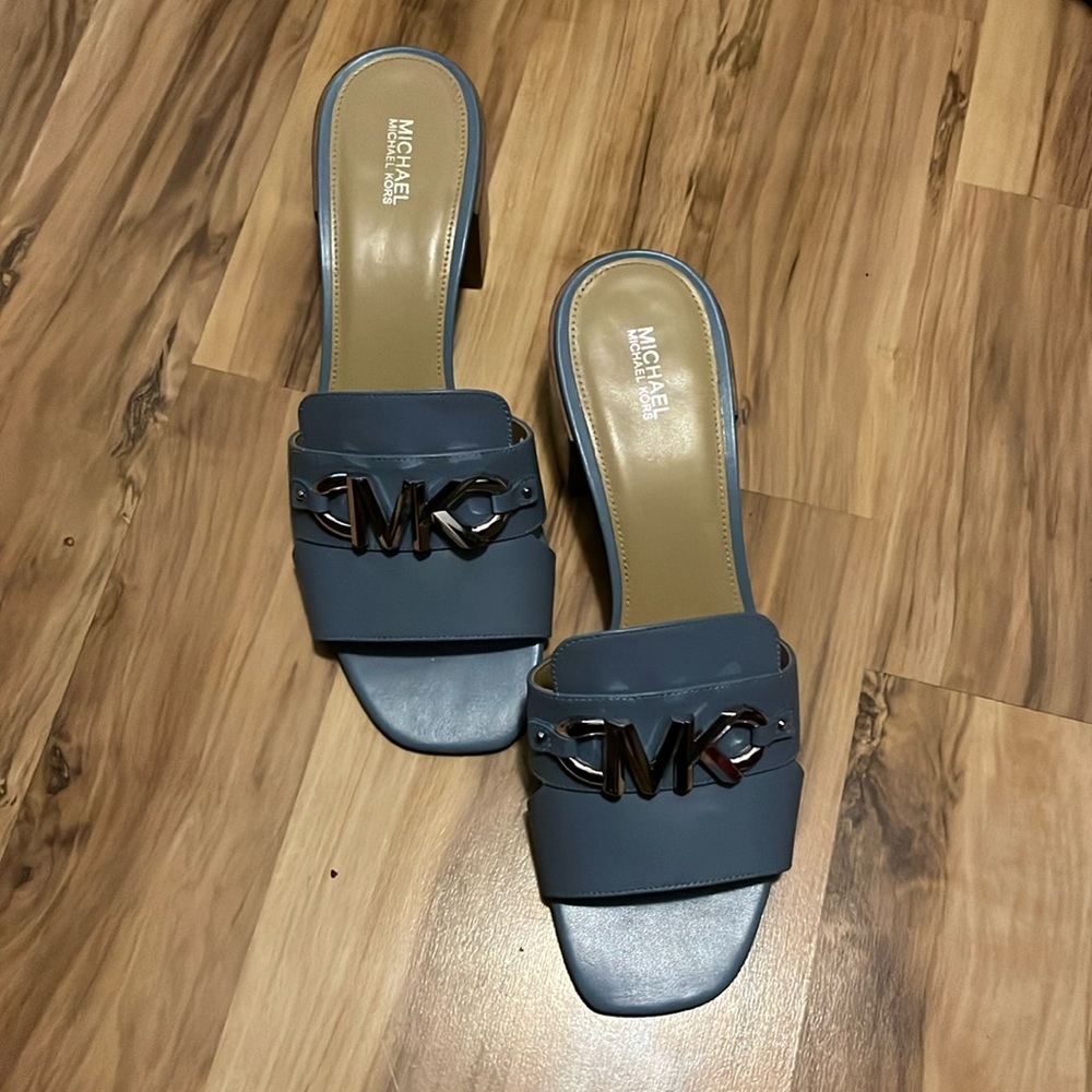 Michael Kors Mules. Never worn. New with box.
